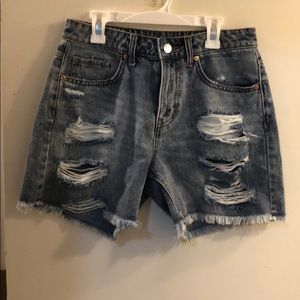 Distressed blue jean shorts